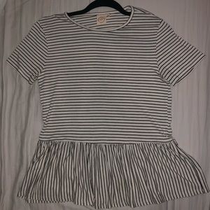 white top with black stripes